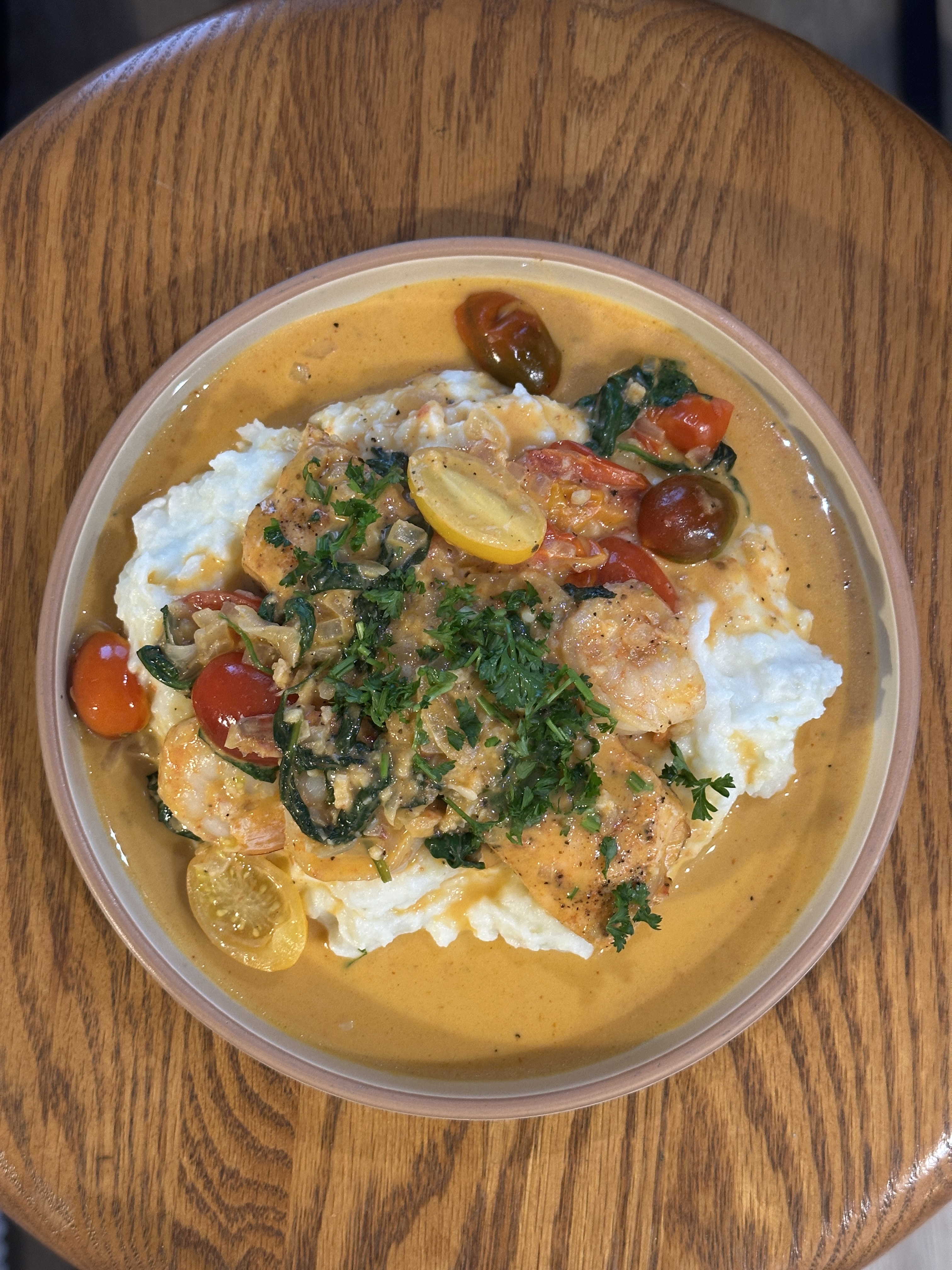 Flavorful, rich, cajun salmon w/ mashed and greens